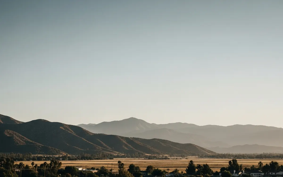 Calm Verdugo Mountains foothills and open valley near Burbank under soft morning light with wide sky