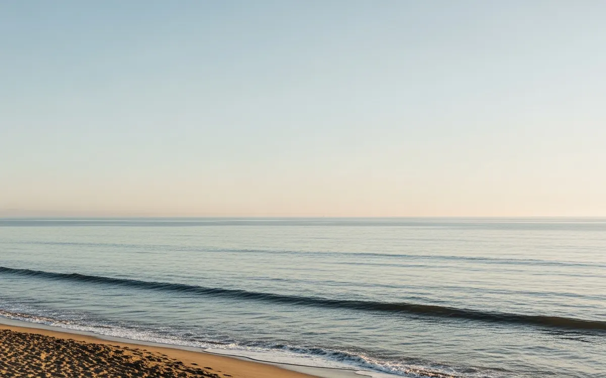 Calm South Bay coastal landscape near El Segundo under soft morning light with wide open sky